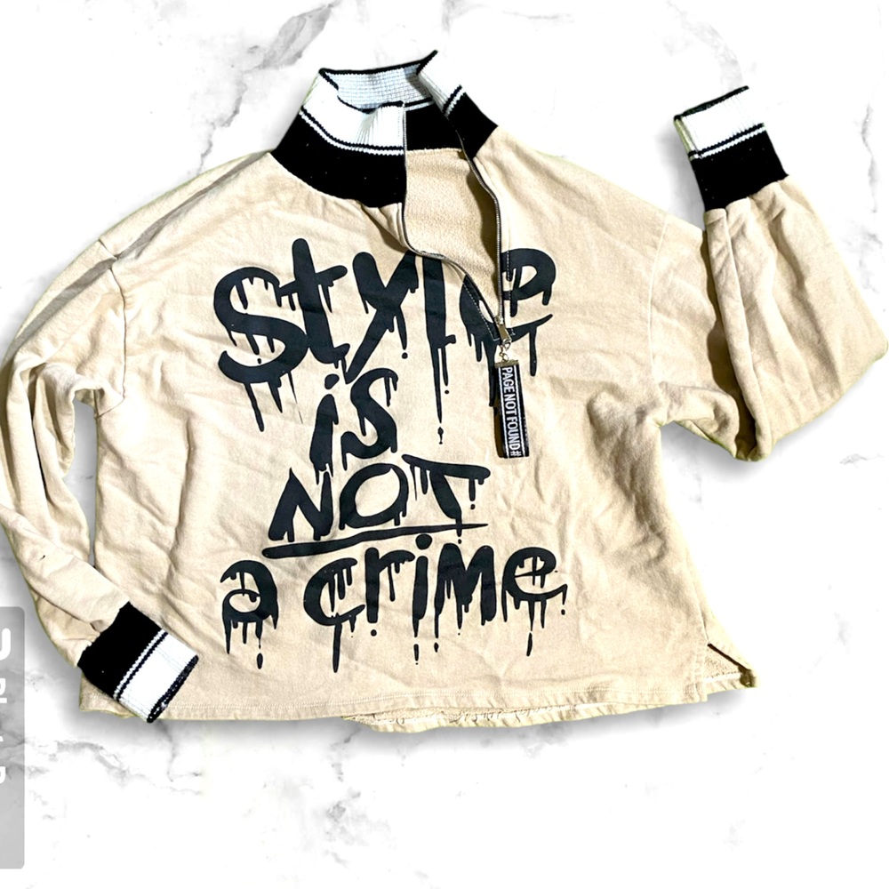 Size large half zip ( off centered ) tan white and black